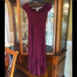 Wine colored dress. Very flattering.